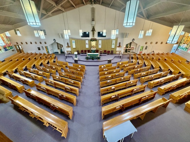A wide view of the pews inside Saint Anne Church.