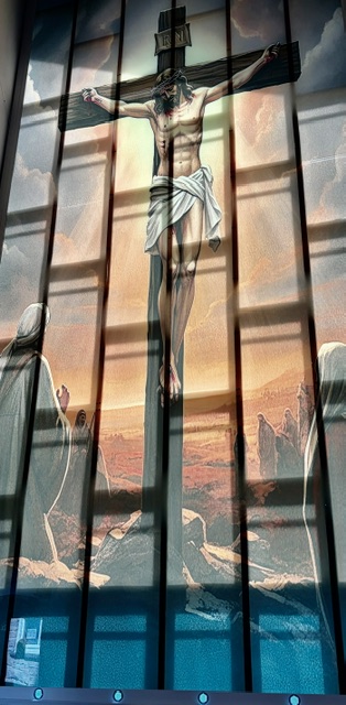 A depiction of the Crucifixion of Christ with mourners nearby.